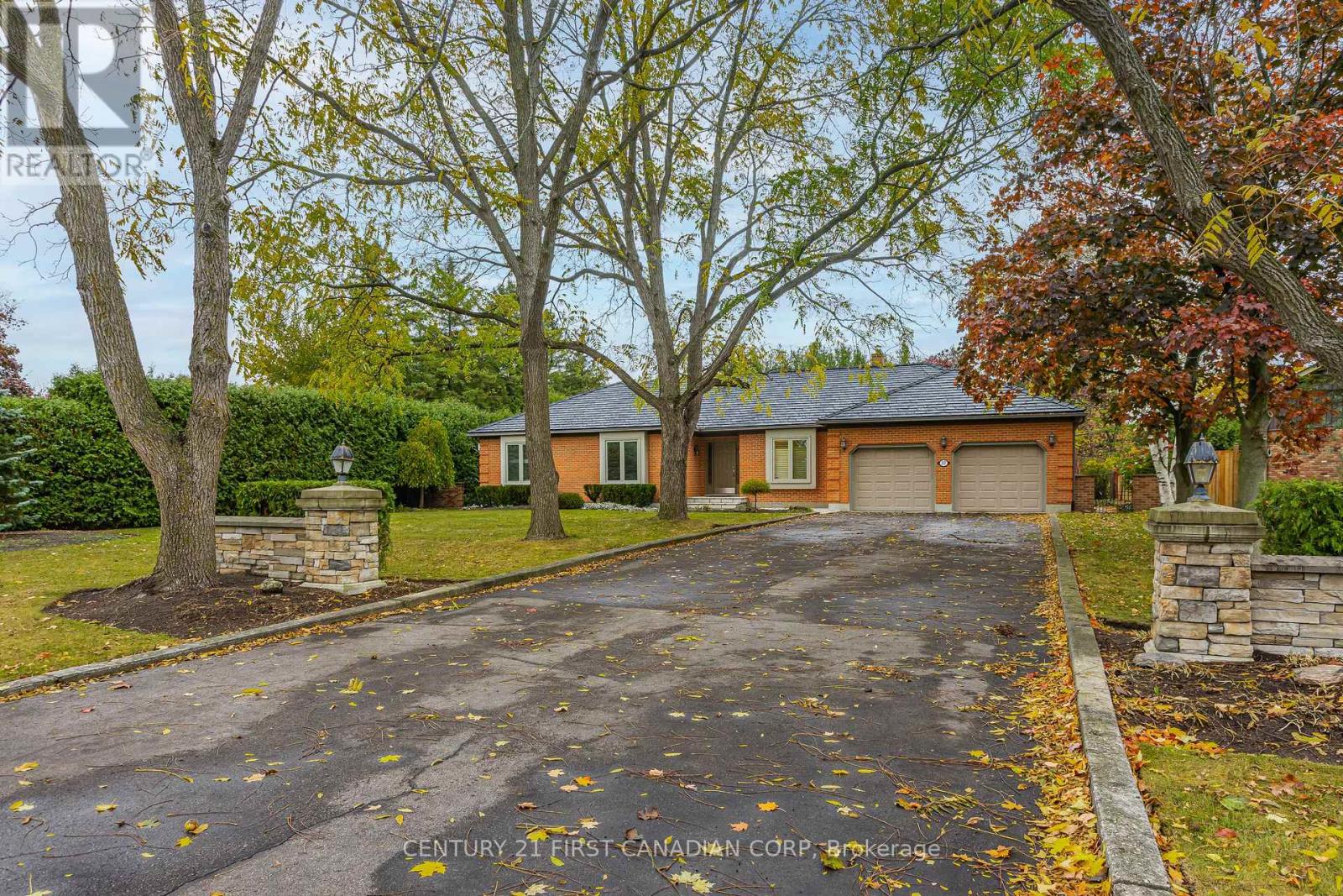 Discover the perfect blend of small-town charm and big-city convenience at 37 Outer Drive in the heart of Lambeth, London, Ontario. This executive bungalow sits proudly on a rare 0.5+ acre lot-a true gem within city limits-offering privacy, space, and luxury living both inside and out. Step inside this over 2,100 sq. ft. main-floor bungalow, featuring an open-concept layout ideal for entertaining and family living. Large windows fill the home with natural light, while the spacious living and dining areas flow seamlessly into a chef-inspired kitchen overlooking the incredible backyard. The fully finished basement adds even more living space, complete with a wet bar, recreation area, and room for guests or extended family-perfect for movie nights or hosting gatherings. Outside, experience your very own backyard oasis. Enjoy summer days by the inground swimming pool or unwind while walking your landscaped grounds admiring the gardens and mature trees. The convenient outdoor bathroom keeps wet feet out of the house, while the expansive yard provides endless possibilities for entertaining or relaxation. Located in one of Lambeth's most sought-after communities, this property offers tranquility, space, and comfort-just minutes from shopping, dining, highways, and top-rated schools. (id:48254)