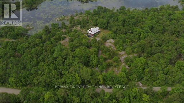 1146 Fourth Lake Road S, Frontenac (Frontenac Centre), Ontario  K0H 2K0 - Photo 2 - X12340452