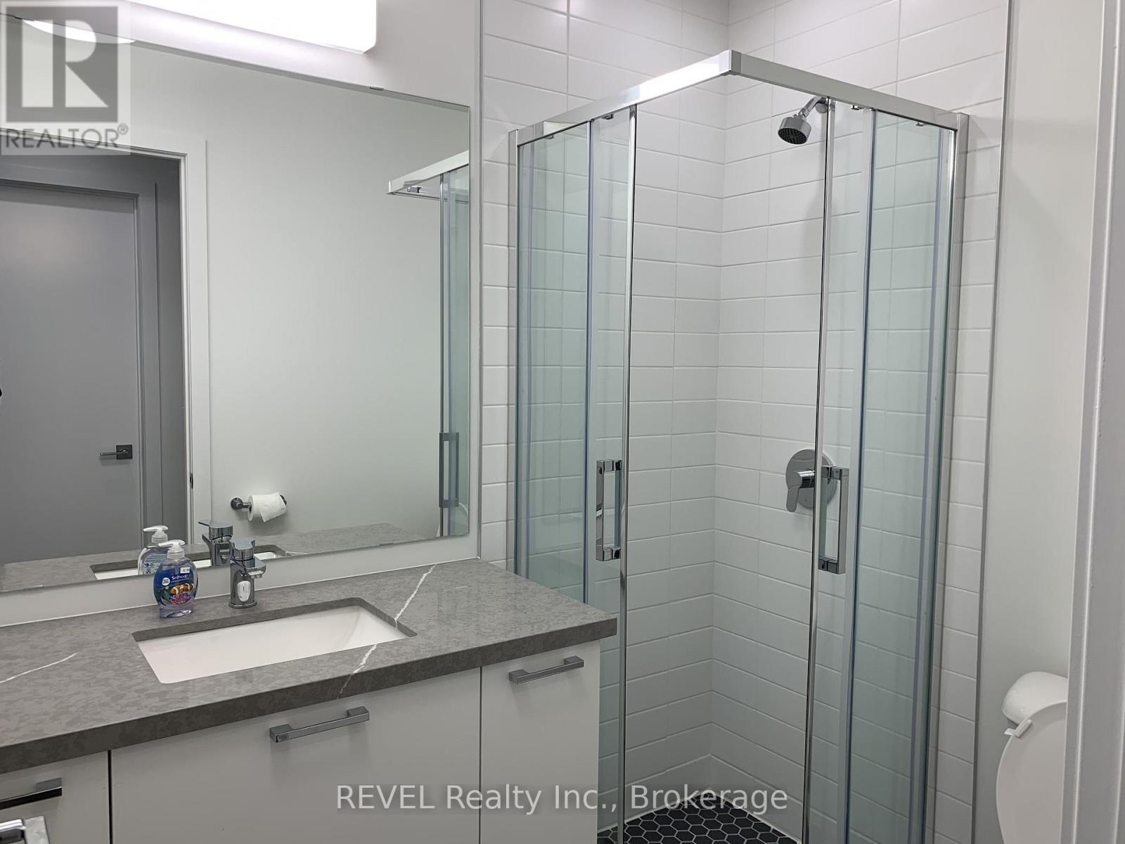 407 - 479 Charlton Avenue E, Hamilton (Stinson), Ontario  L8N 0B4 - Photo 9 - X12480225