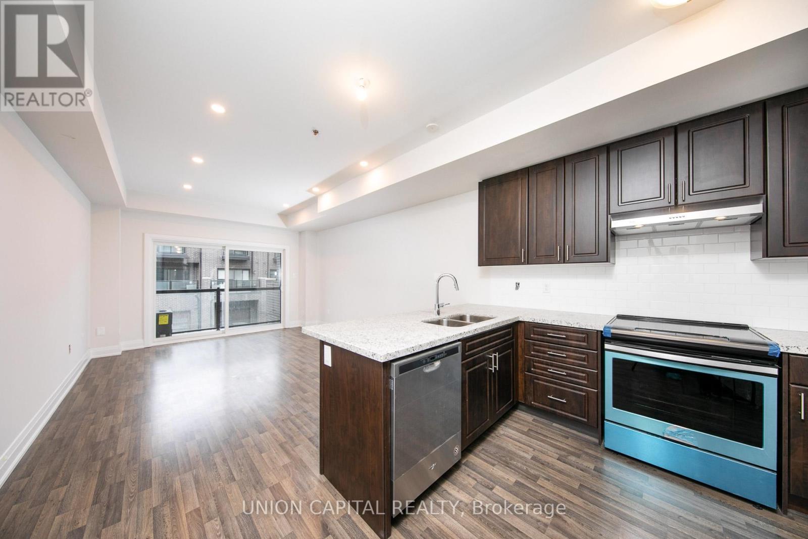 59 Creekbank Road, Toronto, Ontario  M6L 0A4 - Photo 2 - W12480226