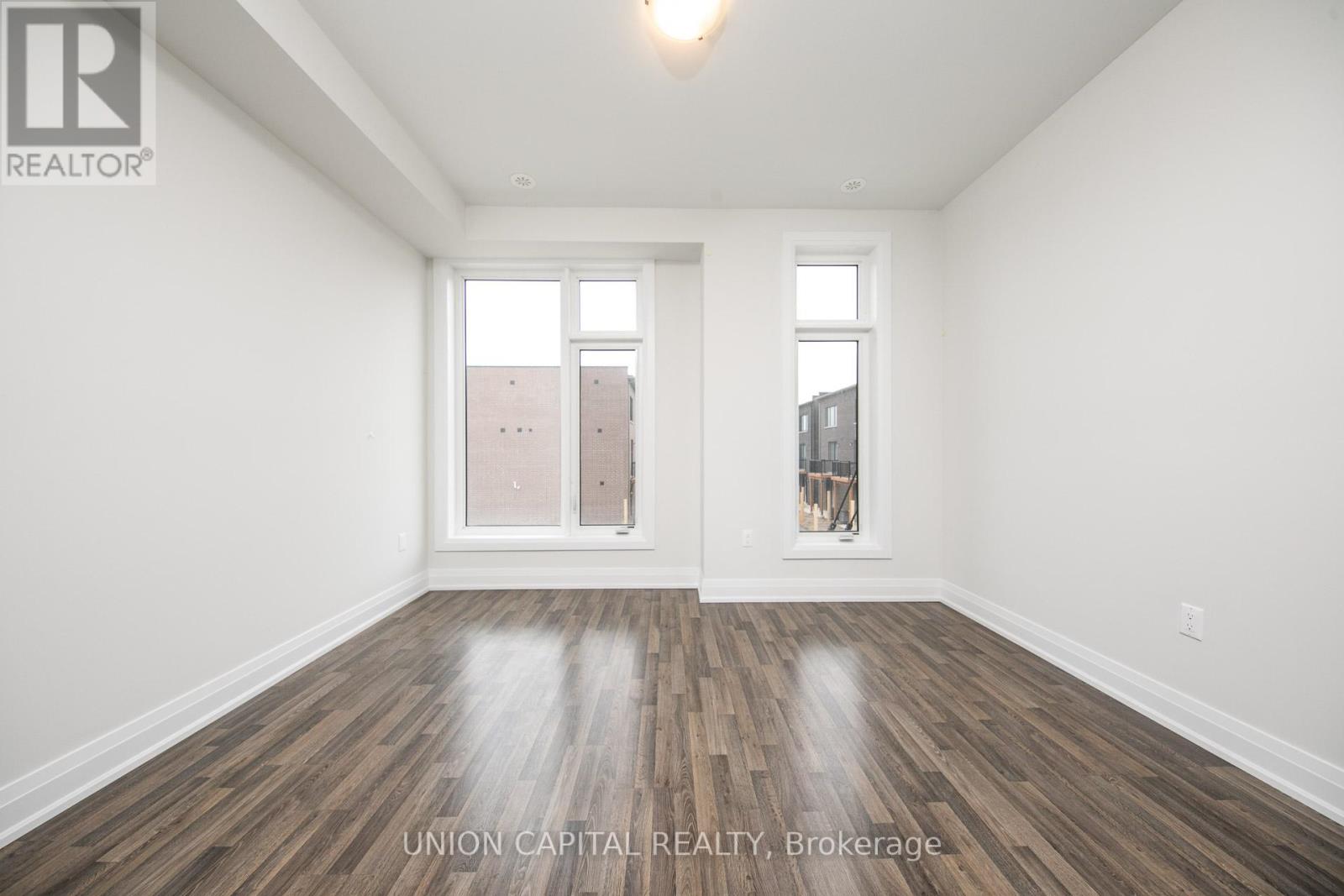 59 Creekbank Road, Toronto, Ontario  M6L 0A4 - Photo 4 - W12480226