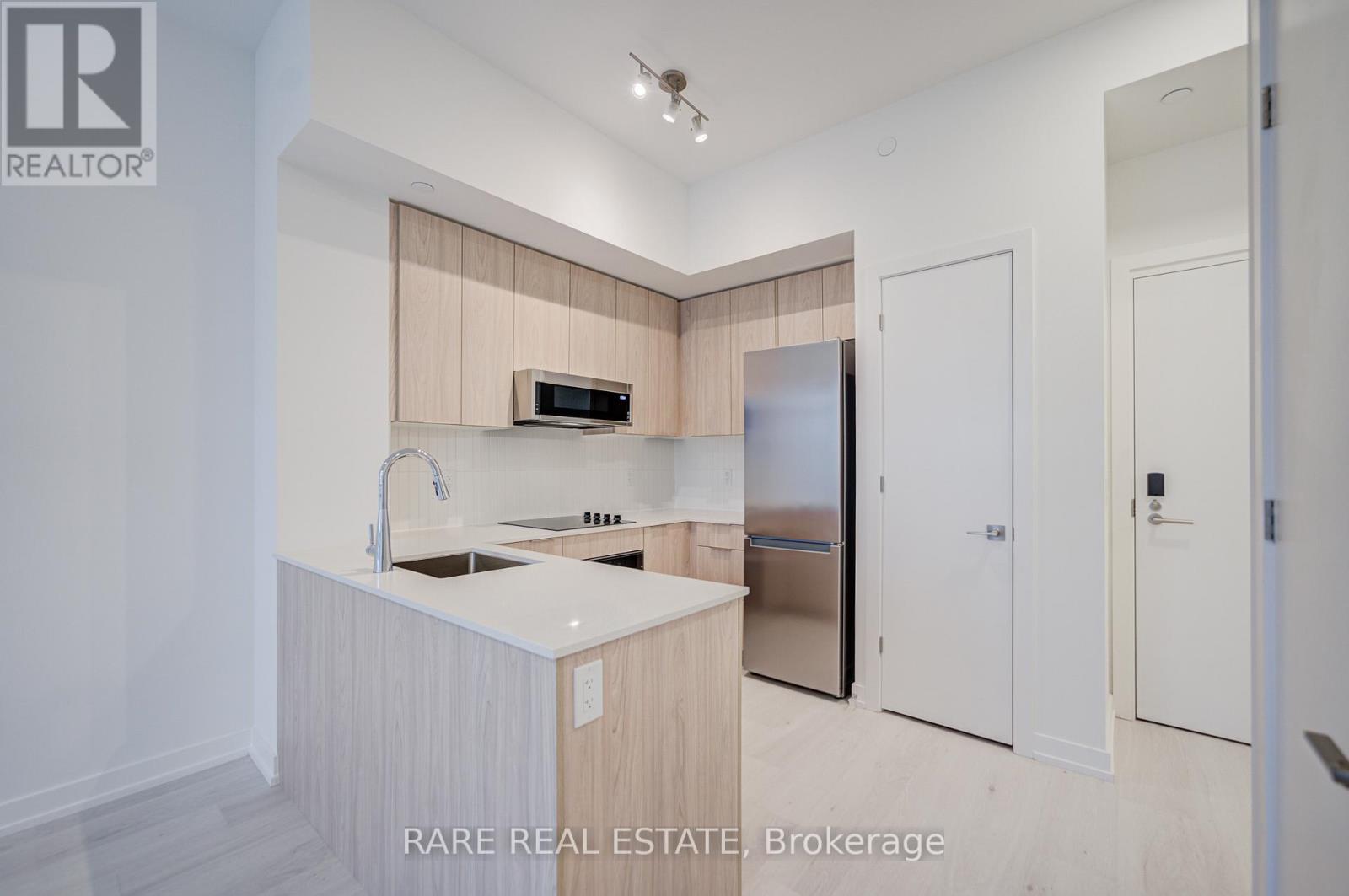 403 - 2501 Saw Whet Boulevard, Oakville, Ontario  L6M 5N2 - Photo 7 - W12480132