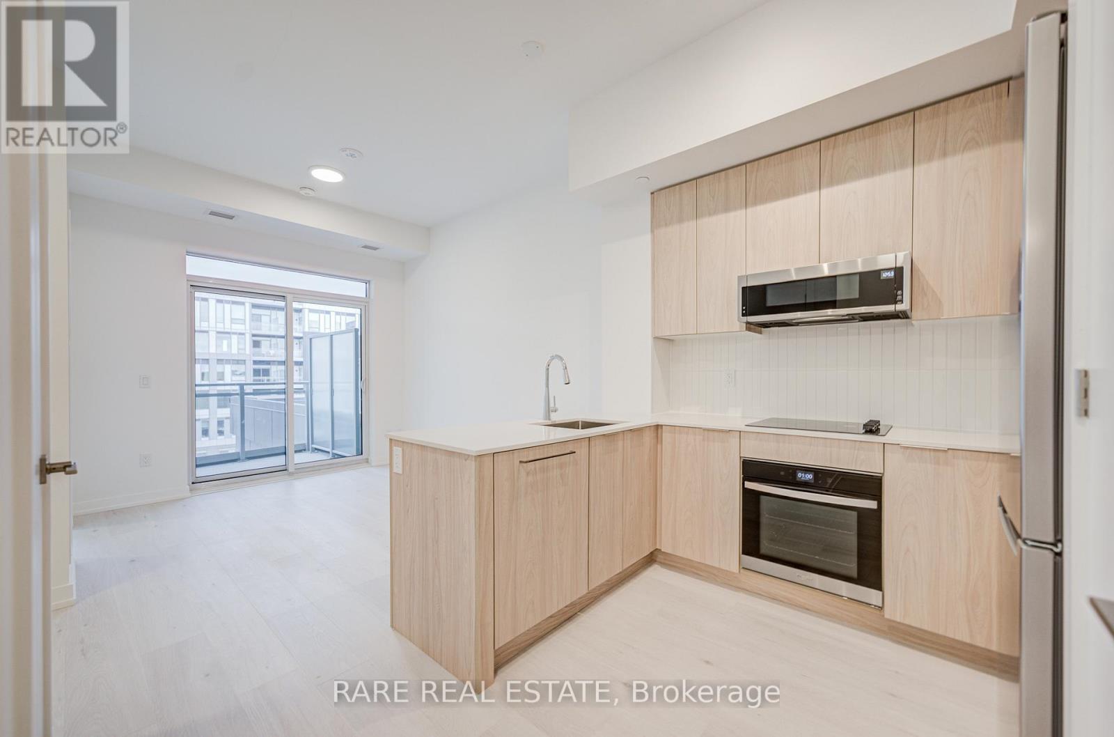 403 - 2501 Saw Whet Boulevard, Oakville, Ontario  L6M 5N2 - Photo 6 - W12480132