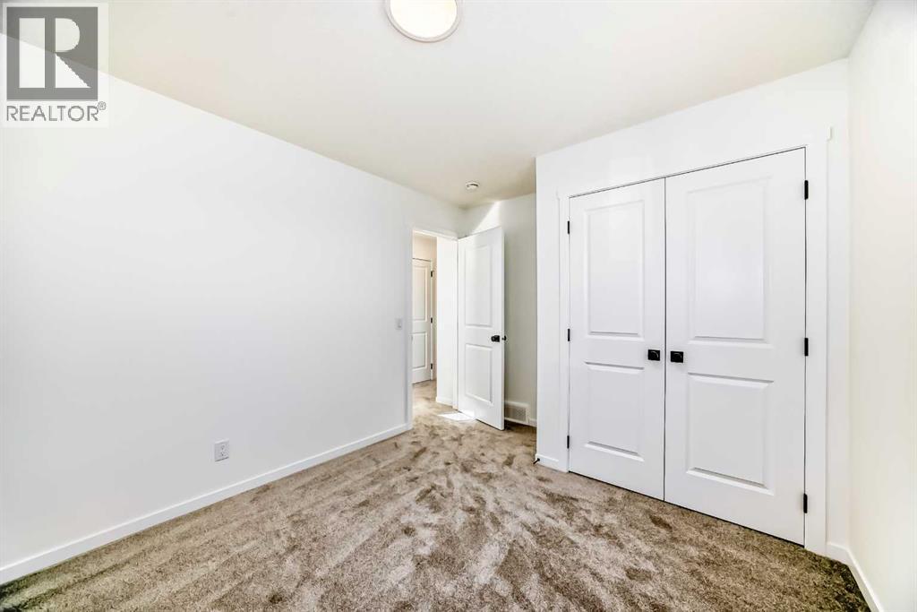 40 Southborough Common, Cochrane, Alberta  T4C 3L9 - Photo 33 - A2265504