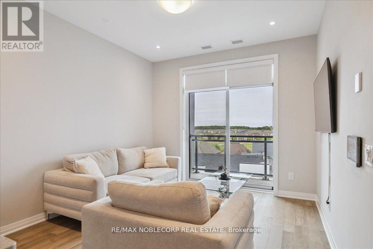 516 - 50 Kaitting Trail, Oakville, Ontario  L6M 4L9 - Photo 9 - W12480438
