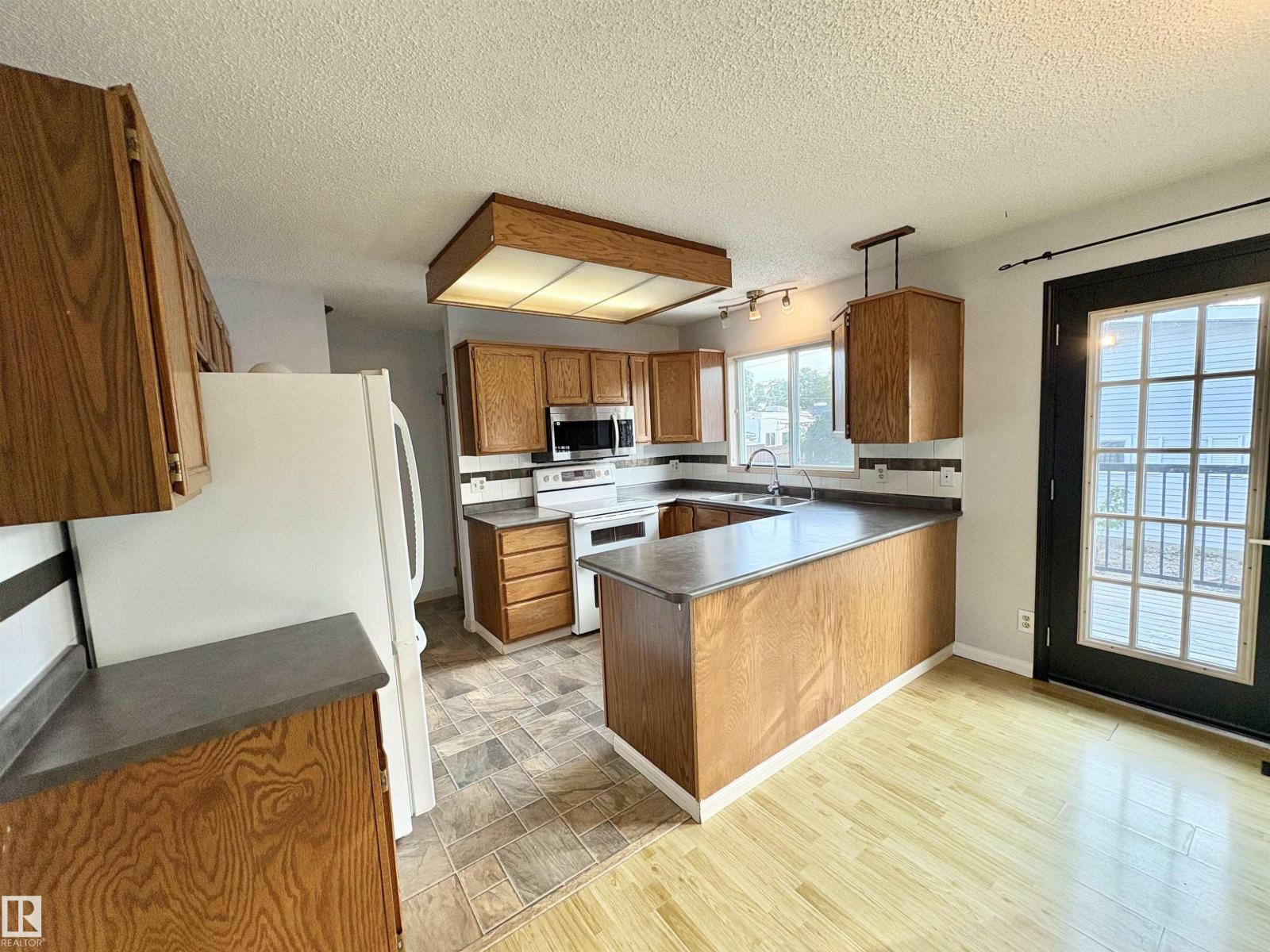 12231 44 St Nw Nw, Edmonton, Alberta  T5W 4Z5 - Photo 11 - E4458321