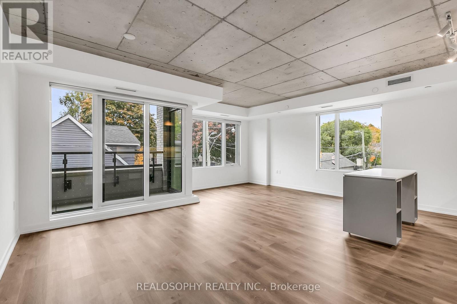 302 - 115 Larchmount Avenue, Toronto, Ontario  M4M 2Y6 - Photo 2 - E12480615