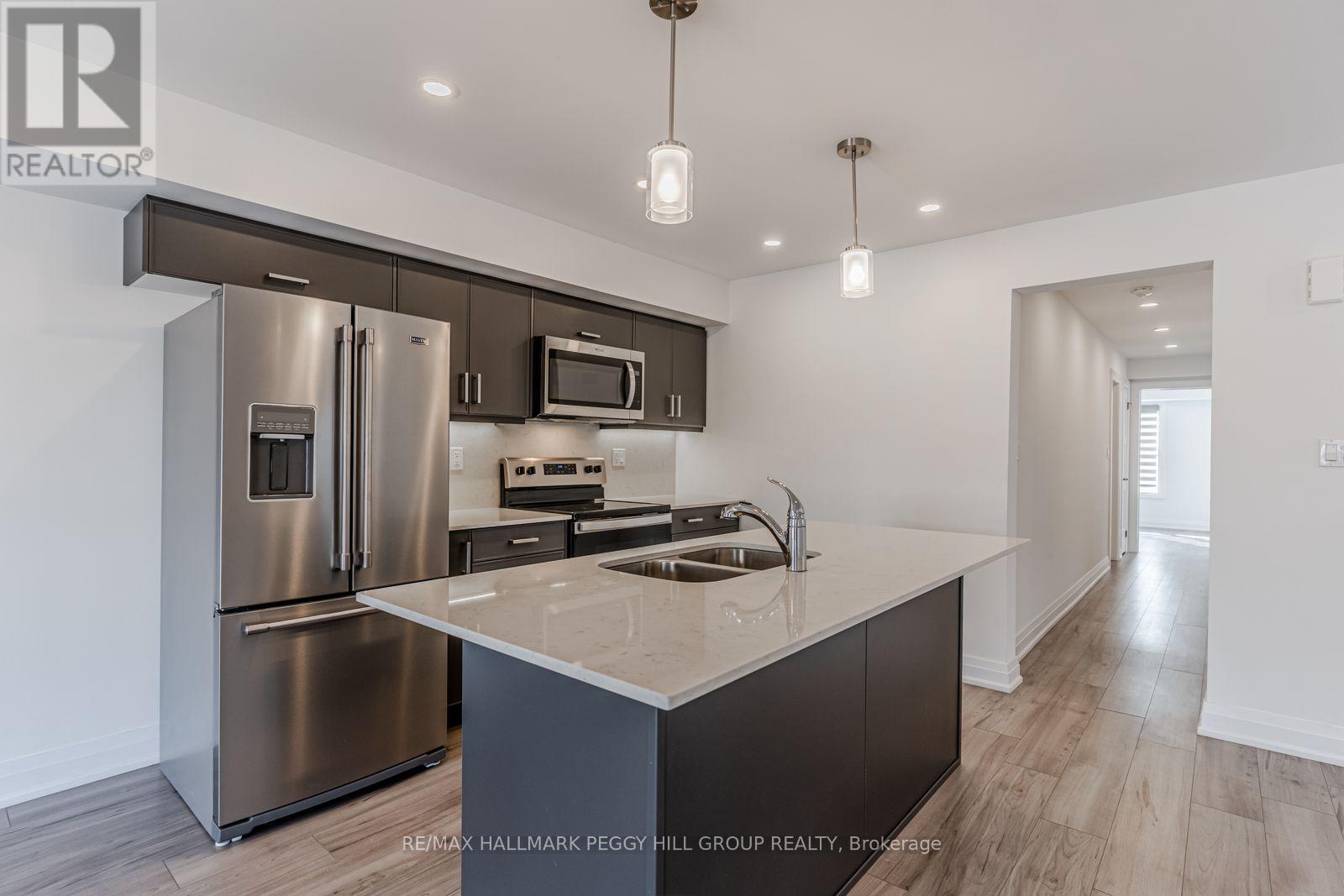 5 - 23 Hay Lane, Barrie, Ontario  L9J 0V6 - Photo 3 - S12480517