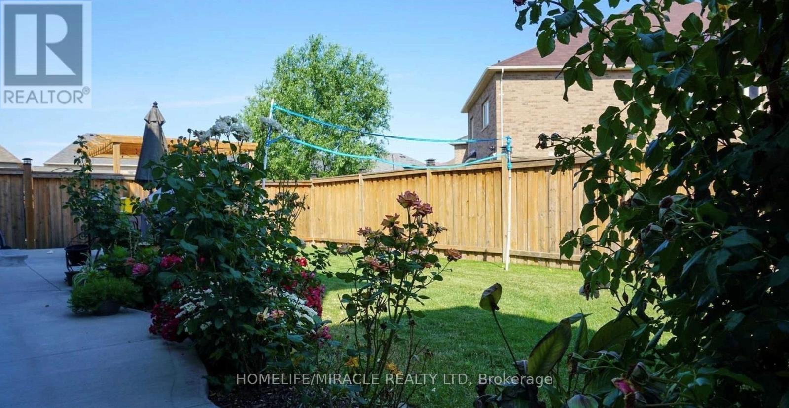 61 Kalmia Road, Brampton, Ontario  L6X 3B3 - Photo 3 - W12480562