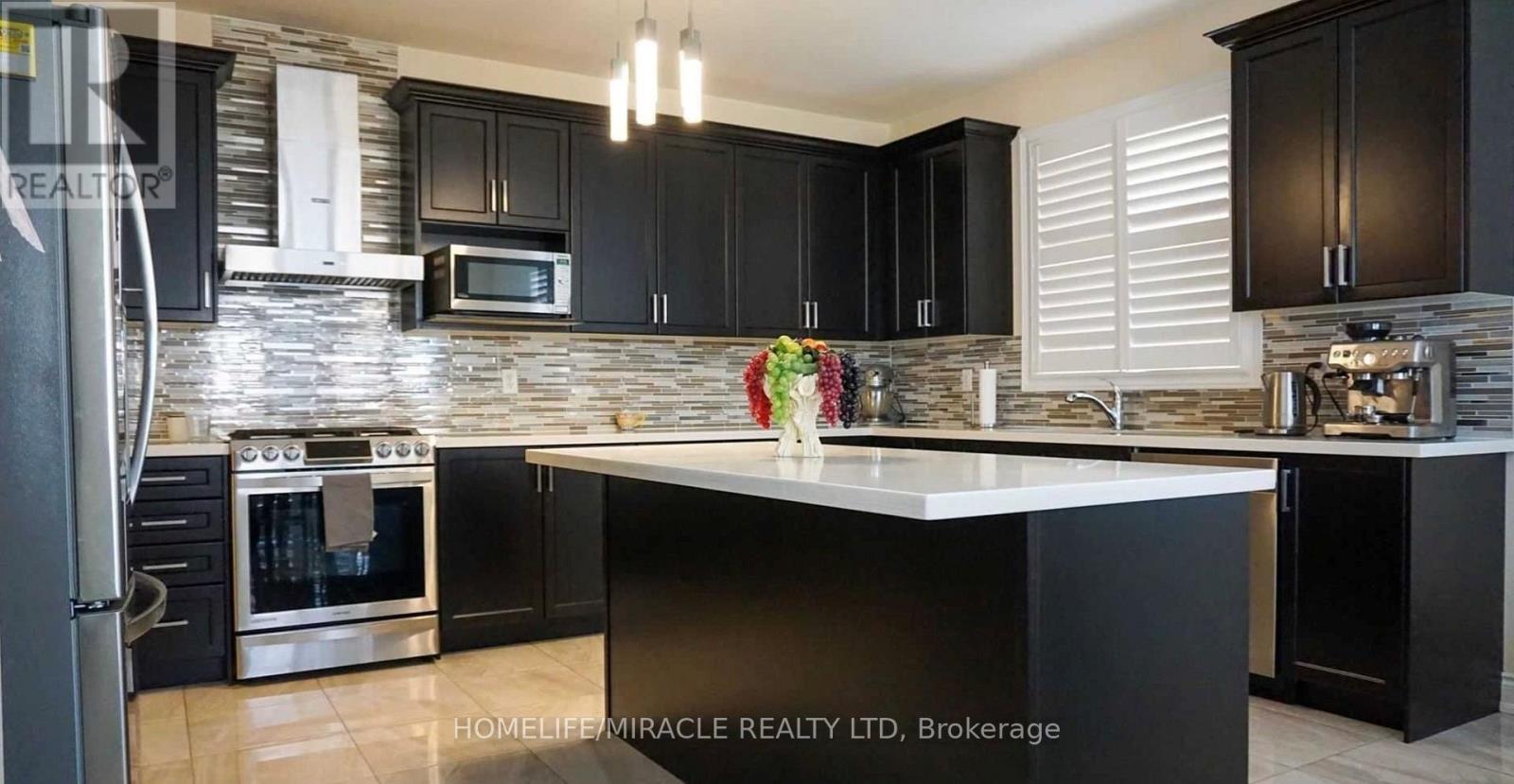 61 Kalmia Road, Brampton, Ontario  L6X 3B3 - Photo 8 - W12480562