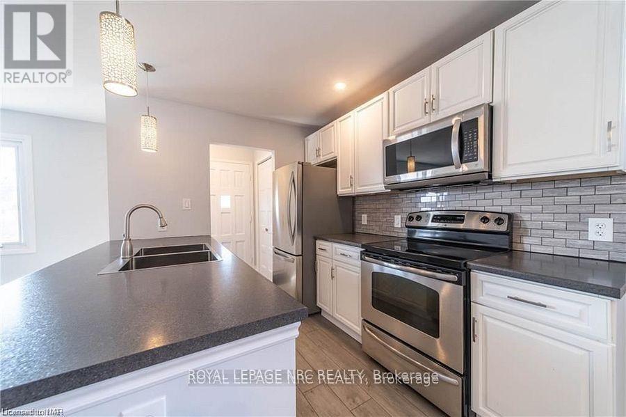 5746 Heritage Drive, Niagara Falls (Church's Lane), Ontario  L2J 3J8 - Photo 5 - X12480656