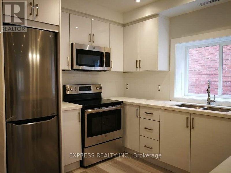 4 - 497 Parkside Drive, Toronto, Ontario  M6R 2Z9 - Photo 5 - W12480829