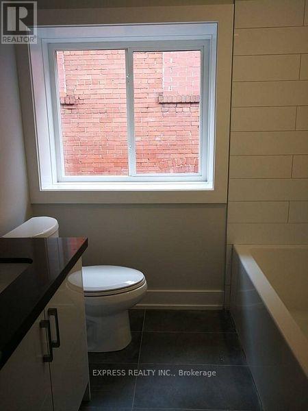 4 - 497 Parkside Drive, Toronto, Ontario  M6R 2Z9 - Photo 7 - W12480829
