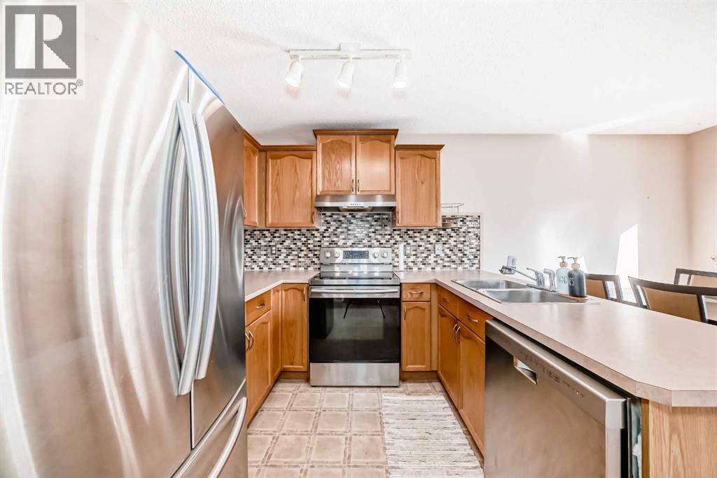 238 Bridleridge Way Sw, Calgary, Alberta  T2Y 4M6 - Photo 7 - A2266444