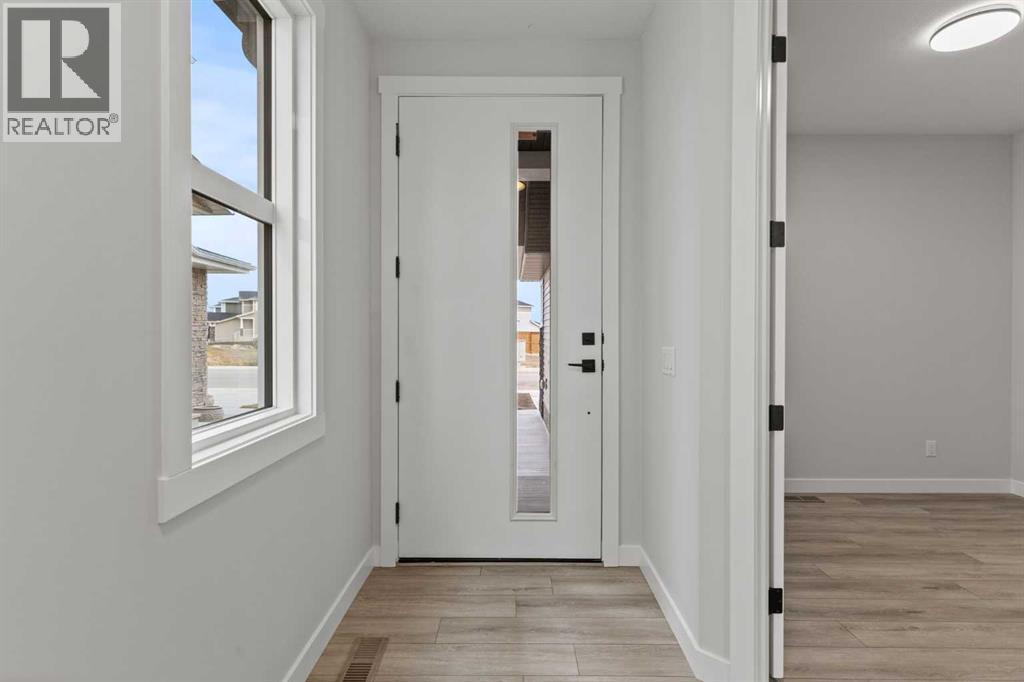 354 Kinniburgh Loop, Chestermere, Alberta  T1X 3C3 - Photo 5 - A2246091