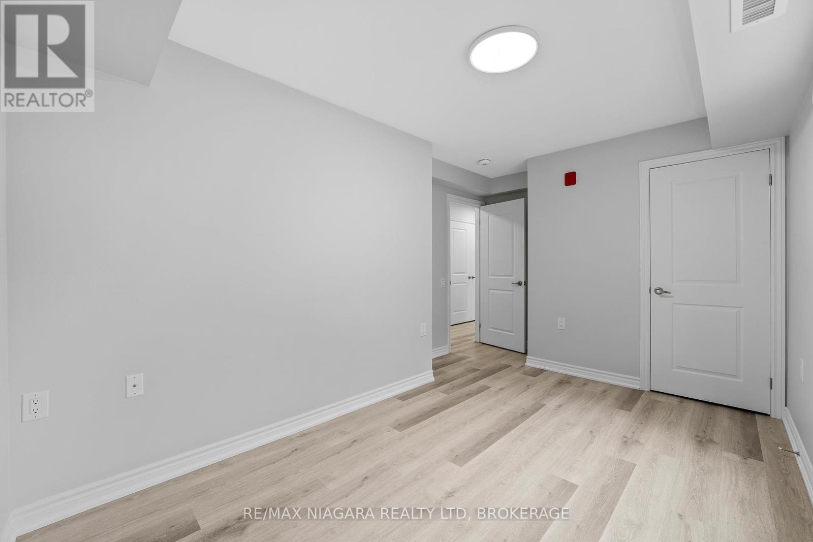 103 - 63 Vine Street S, St. Catharines, Ontario  L2R 3X9 - Photo 12 - X12481130