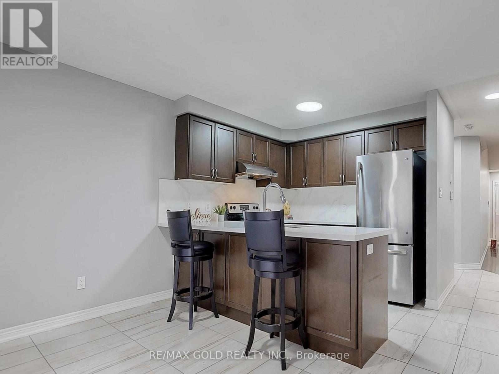 53 Muzzo Drive, Brampton, Ontario  L6R 3W9 - Photo 7 - W12481031