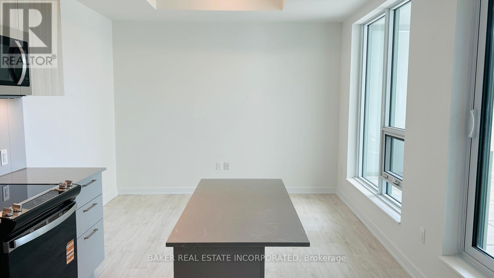 201 - 500 Plains Road E, Burlington, Ontario  L7T 2E1 - Photo 3 - W12481097