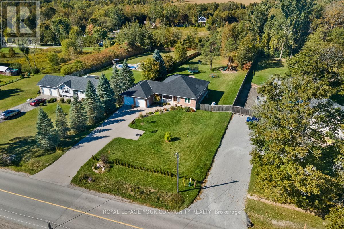 10450 Ravenshoe Road, Georgina, Ontario  L0C 1L0 - Photo 3 - N12481223
