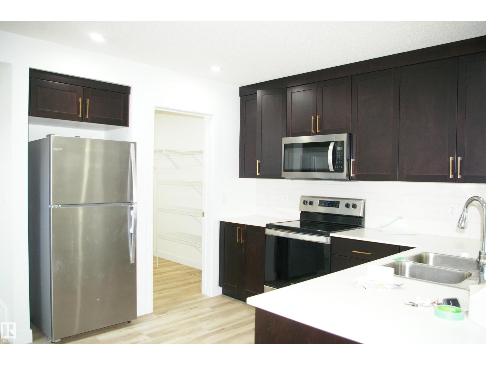 1303 Erker Cr Nw, Edmonton, Alberta  T6M 1N4 - Photo 5 - E4463431