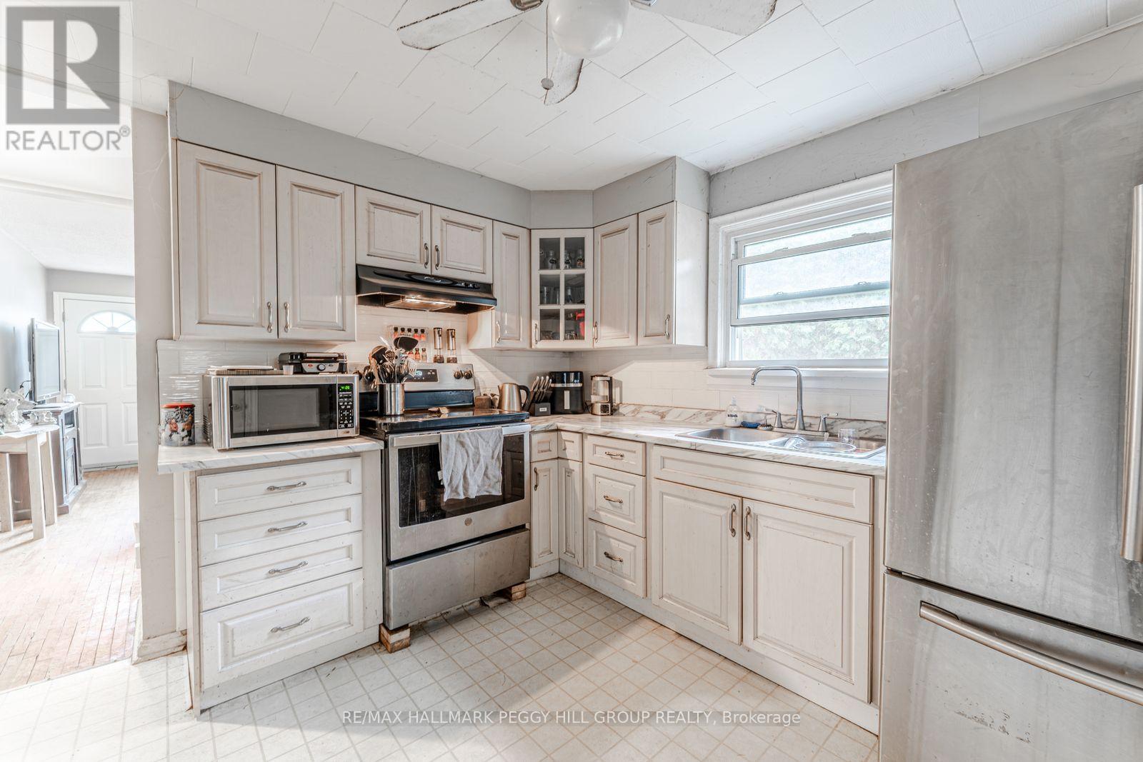 34/36 Centre Street, Essa (Angus), Ontario  L0M 1B0 - Photo 3 - N12481309