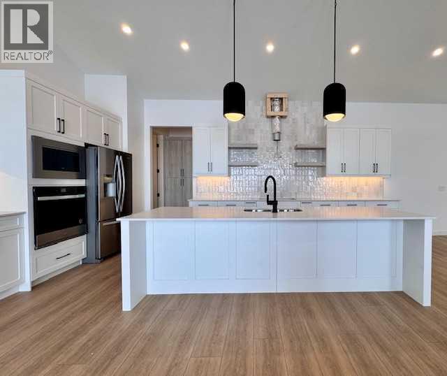 61 North Bridges Bay Sw, Langdon, Alberta  T0J 1X3 - Photo 12 - A2224823