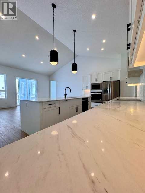 61 North Bridges Bay Sw, Langdon, Alberta  T0J 1X3 - Photo 10 - A2224823