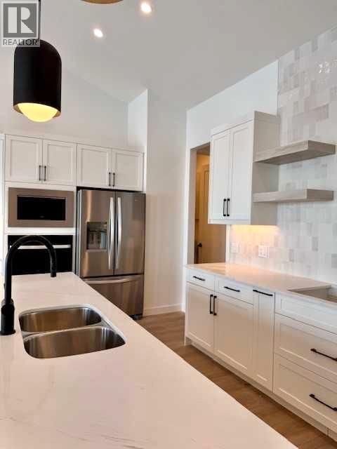 61 North Bridges Bay Sw, Langdon, Alberta  T0J 1X3 - Photo 11 - A2224823