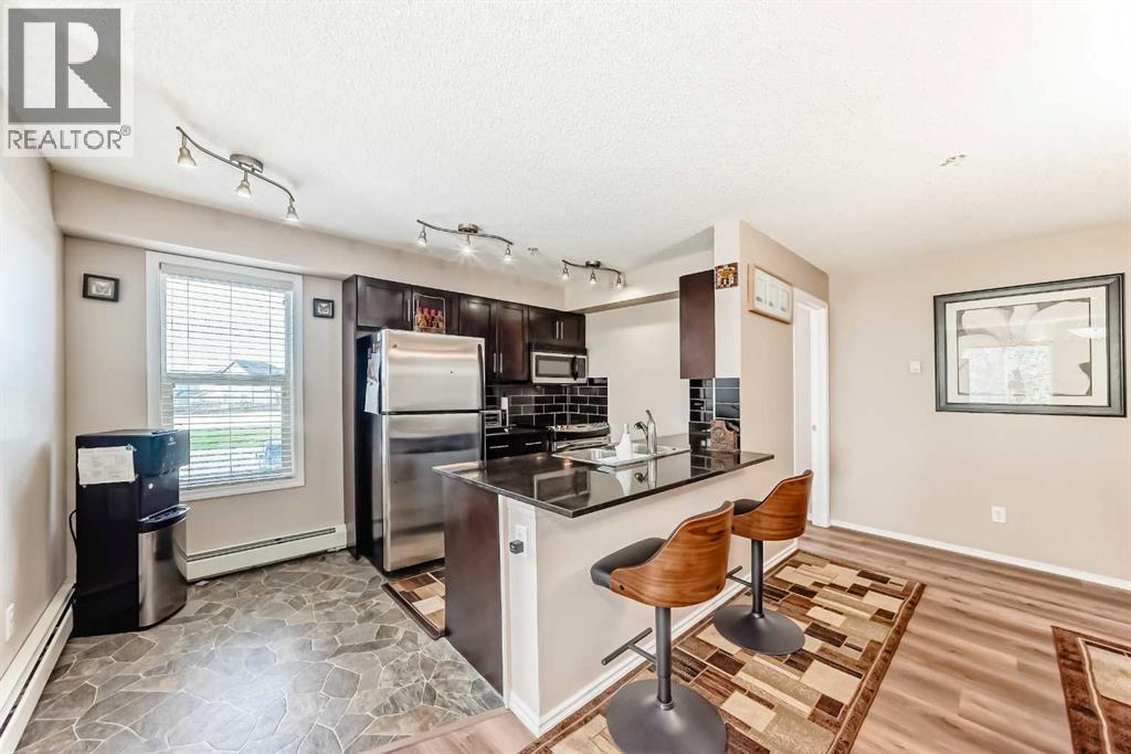 218, 7130 80 Avenue Ne, Calgary, Alberta  T3J 0N5 - Photo 3 - A2250022