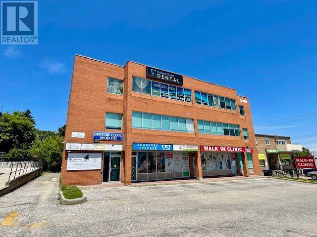 202 - 107 Holland Street E, Bradford West Gwillimbury, Ontario  L3Z 2B7 - Photo 2 - N12086697