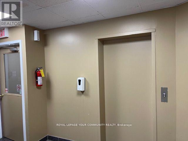 301 - 107 Holland Street E, Bradford West Gwillimbury, Ontario  L9N 1C3 - Photo 3 - N12411751