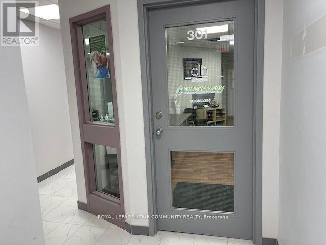 301 - 107 Holland Street E, Bradford West Gwillimbury, Ontario  L9N 1C3 - Photo 4 - N12411751