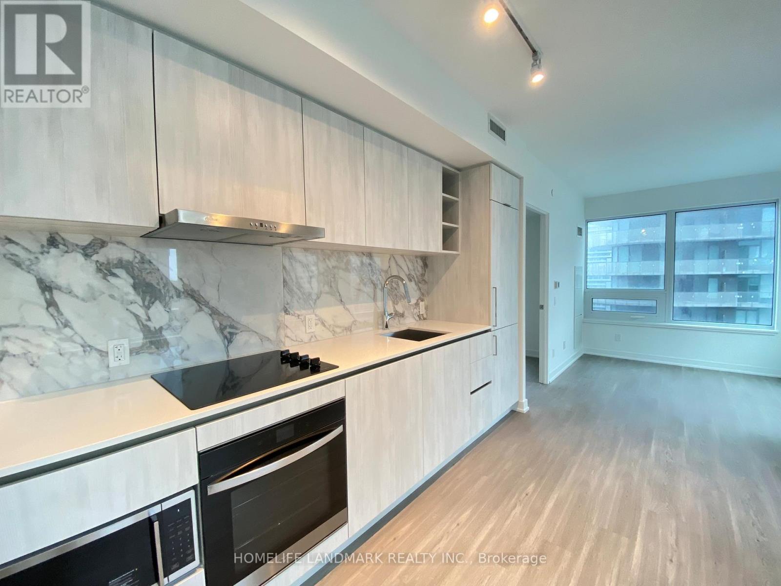 910 - 8 Wellesley Street W, Toronto, Ontario  M4Y 0J5 - Photo 2 - C12481523