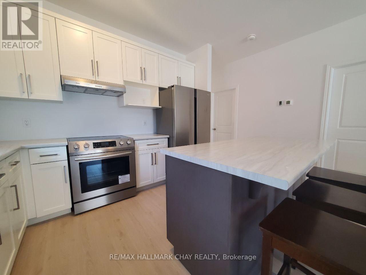 106 Emerson Way, West Grey, Ontario  N0G 1R0 - Photo 2 - X12481428