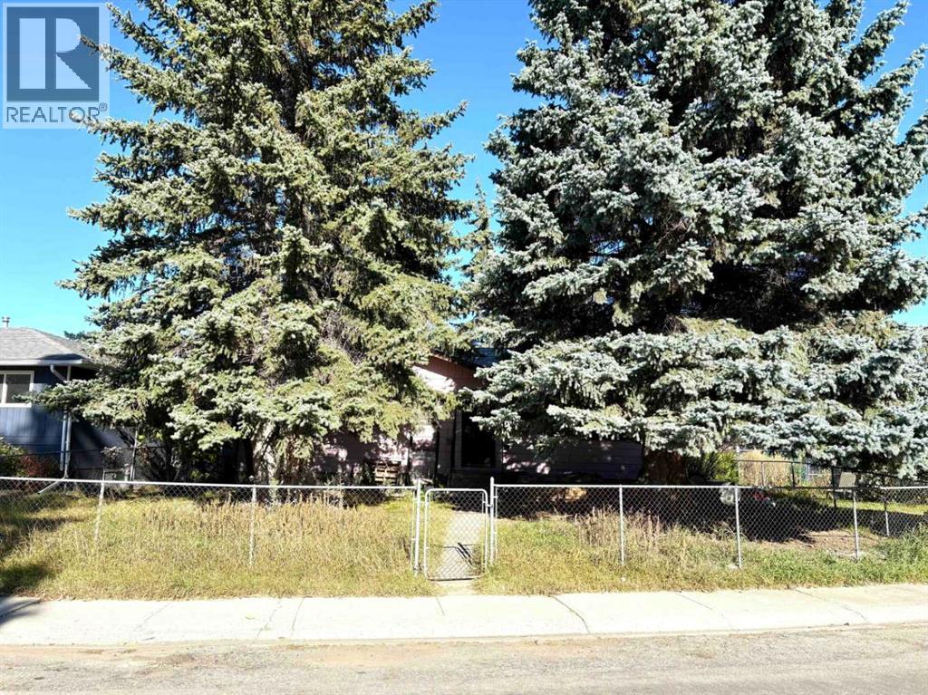 6 Harvey Place Sw, Calgary, Alberta  T2V 3A5 - Photo 1 - A2265907