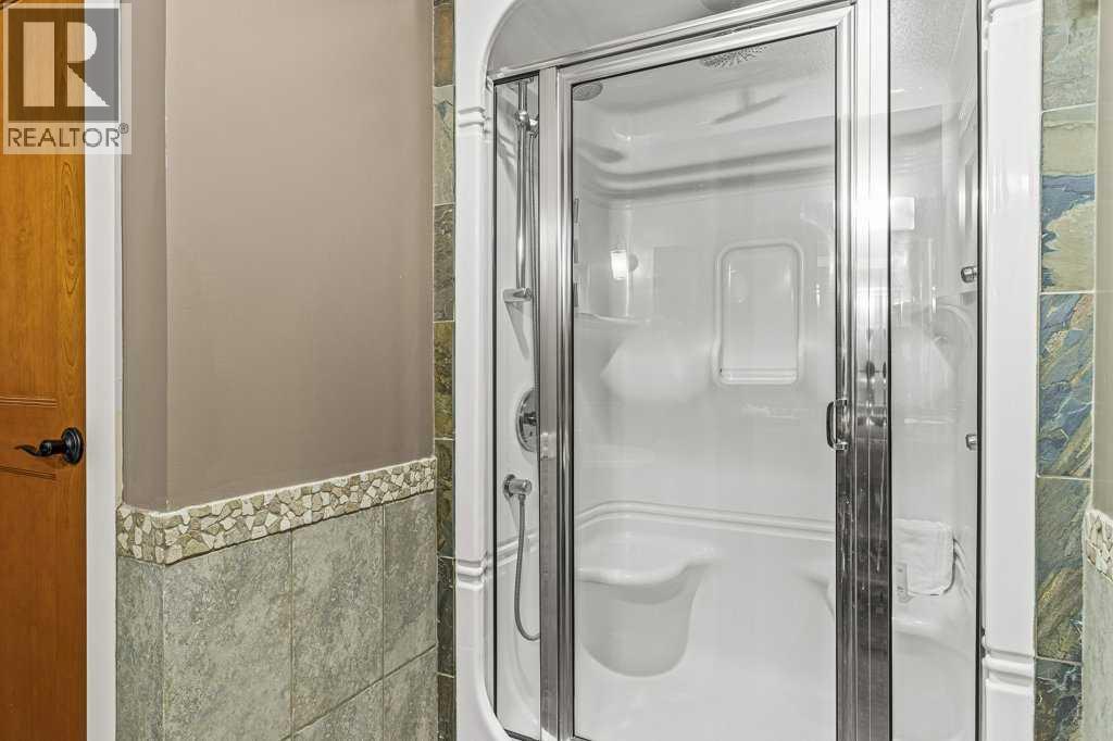 402 D,e,f, 191 Kananaskis Way, Canmore, Alberta  T1W 0A3 - Photo 33 - A2266057