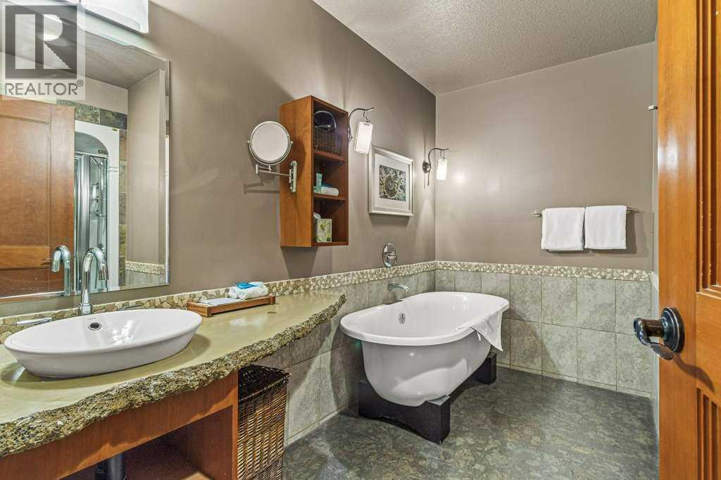 402 D,e,f, 191 Kananaskis Way, Canmore, Alberta  T1W 0A3 - Photo 31 - A2266057