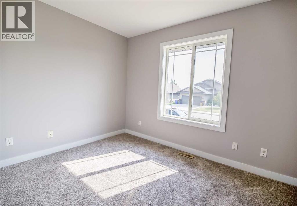 146 Newton Drive, Penhold, Alberta  T0M 1R0 - Photo 8 - A2257366