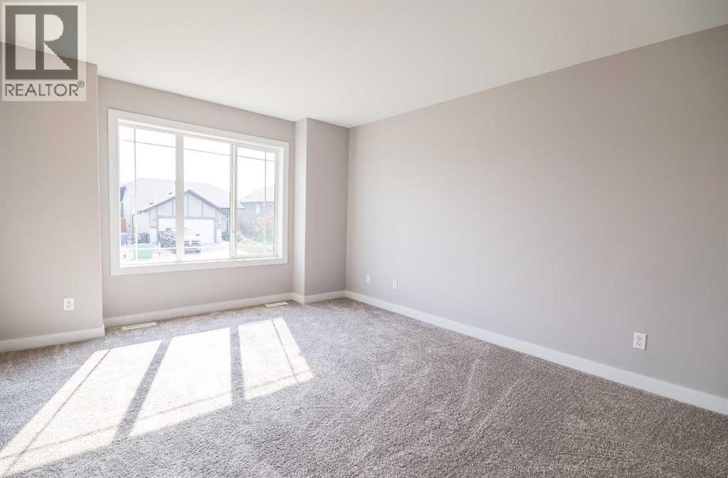 146 Newton Drive, Penhold, Alberta  T0M 1R0 - Photo 2 - A2257366