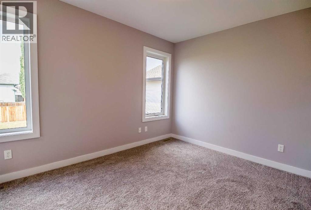 146 Newton Drive, Penhold, Alberta  T0M 1R0 - Photo 6 - A2257366