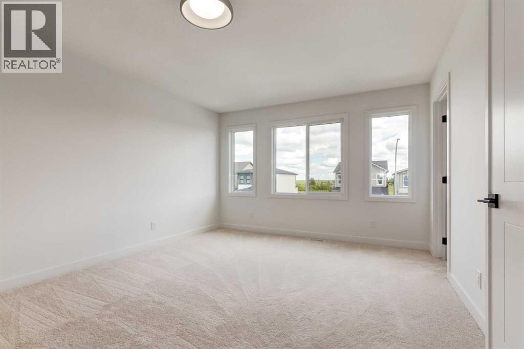 65 Andalusian Road, Cochrane, Alberta  T4C 3L8 - Photo 14 - A2260247