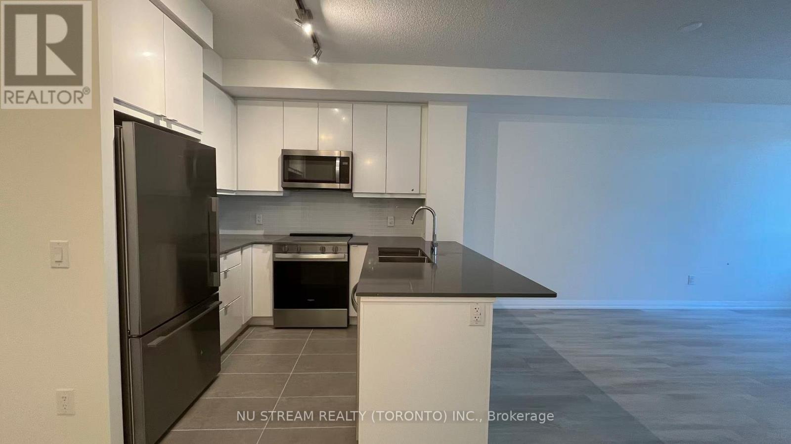 310 - 3260 Sheppard Avenue E, Toronto, Ontario  M1T 3K3 - Photo 4 - E12481752