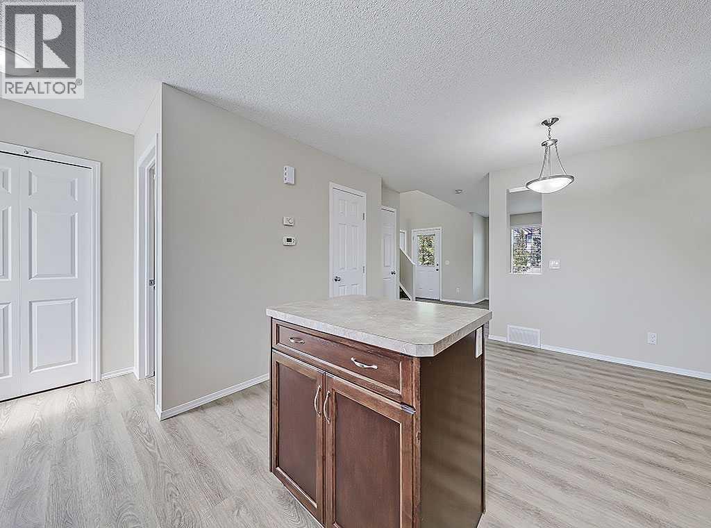 483 Cimarron Boulevard, Okotoks, Alberta  T1S 0J6 - Photo 9 - A2239117