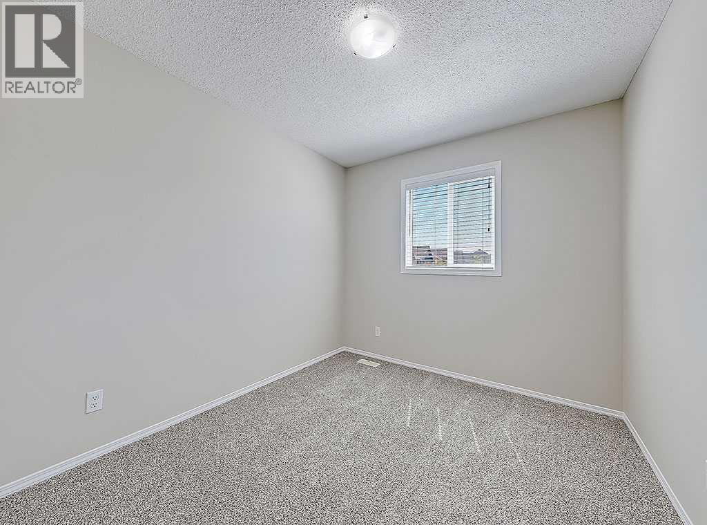 483 Cimarron Boulevard, Okotoks, Alberta  T1S 0J6 - Photo 24 - A2239117