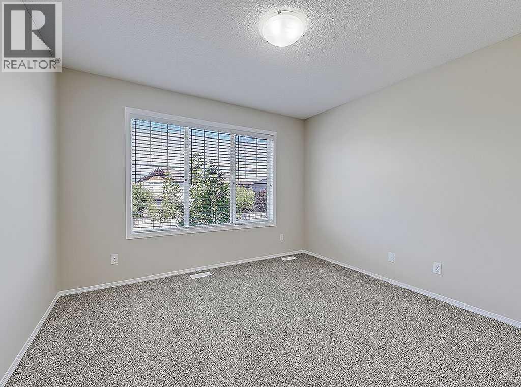 483 Cimarron Boulevard, Okotoks, Alberta  T1S 0J6 - Photo 19 - A2239117