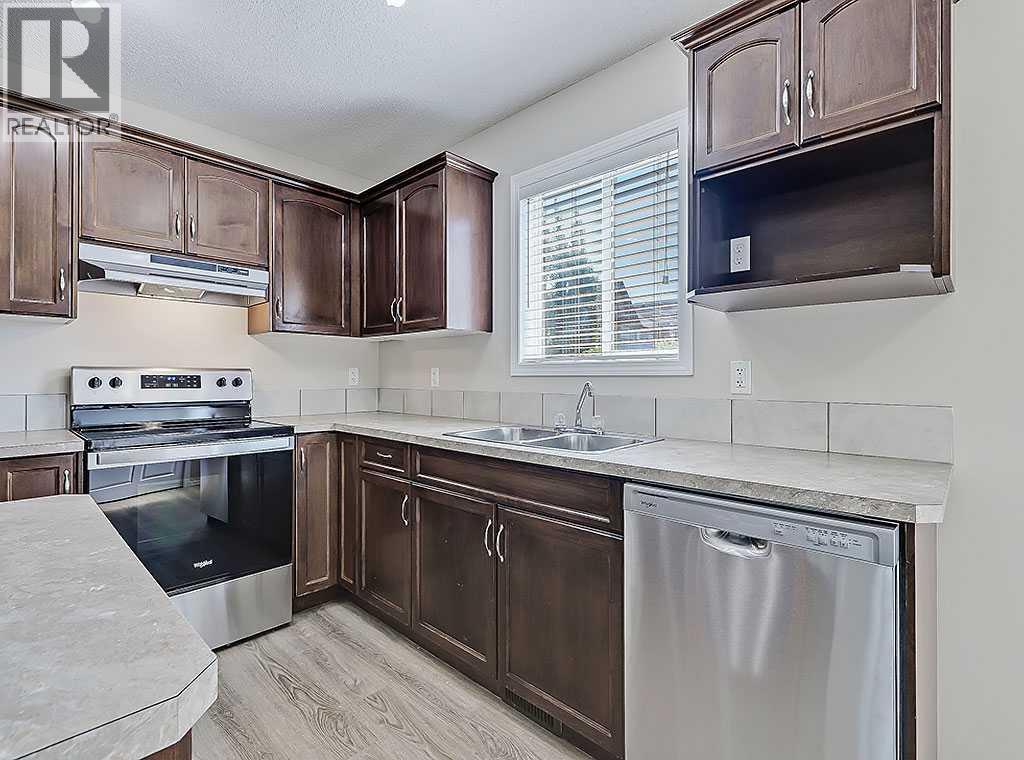 483 Cimarron Boulevard, Okotoks, Alberta  T1S 0J6 - Photo 6 - A2239117