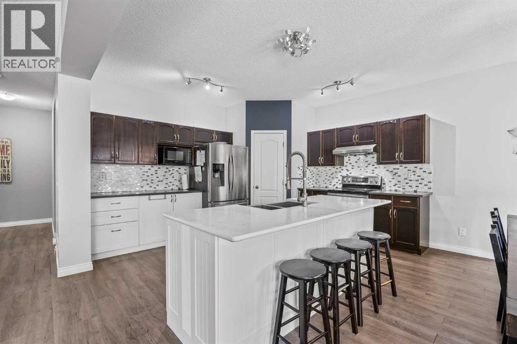 303 Westmount Court, Okotoks, Alberta  T1S 0B6 - Photo 12 - A2264302