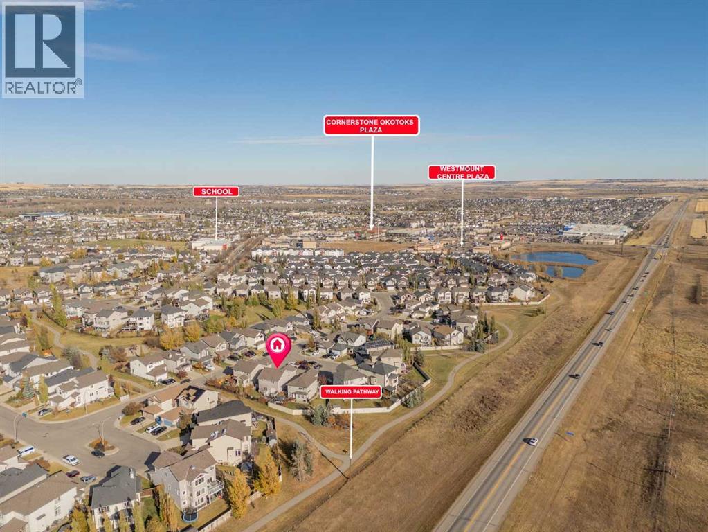 303 Westmount Court, Okotoks, Alberta  T1S 0B6 - Photo 2 - A2264302