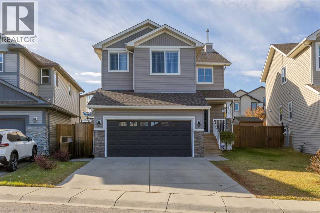 303 Westmount Court, Okotoks, Alberta  T1S 0B6 - Photo 3 - A2264302