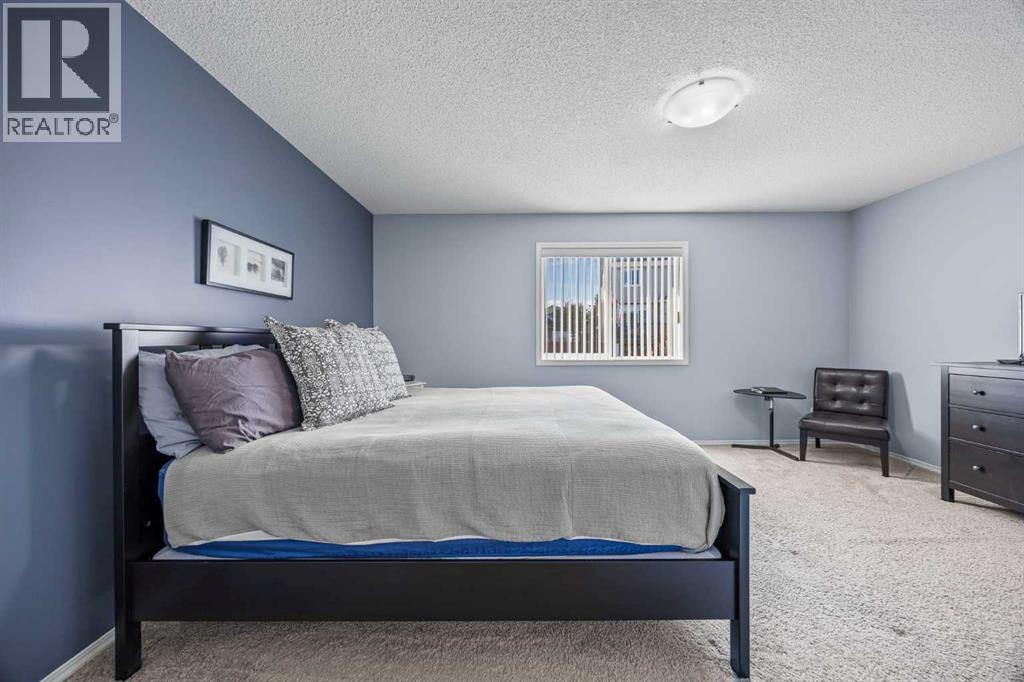 303 Westmount Court, Okotoks, Alberta  T1S 0B6 - Photo 27 - A2264302